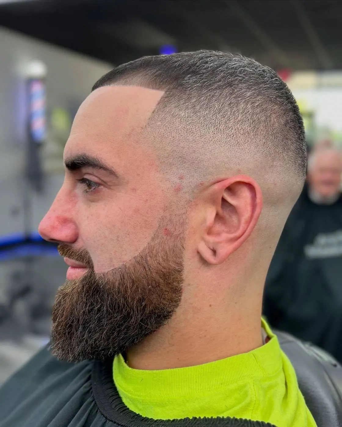High skin fade and full beard