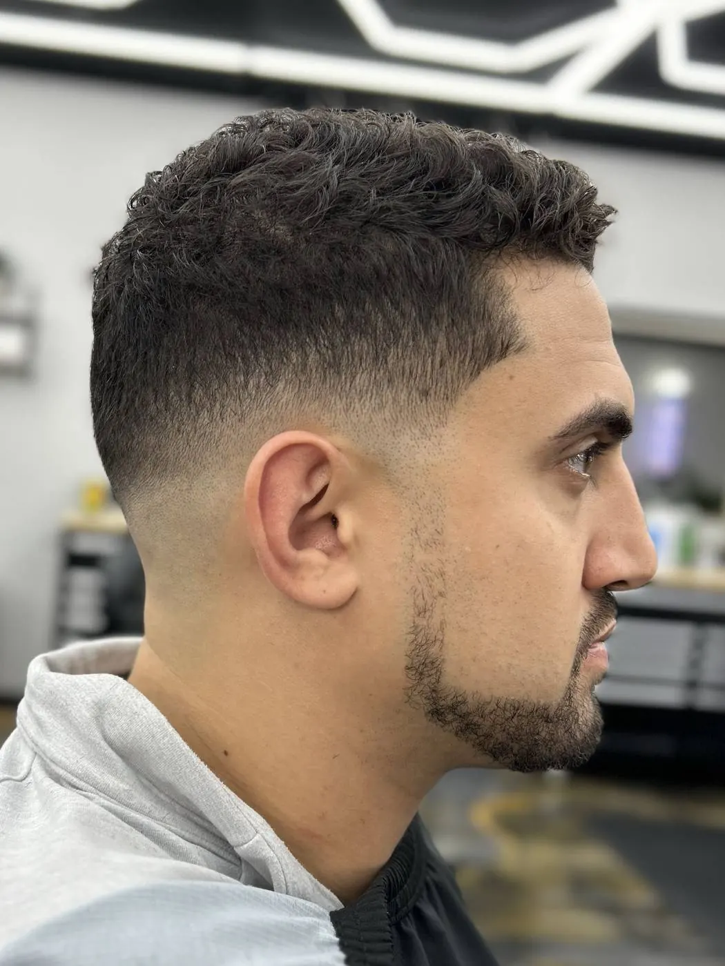 Skin fade with a lined-up beard